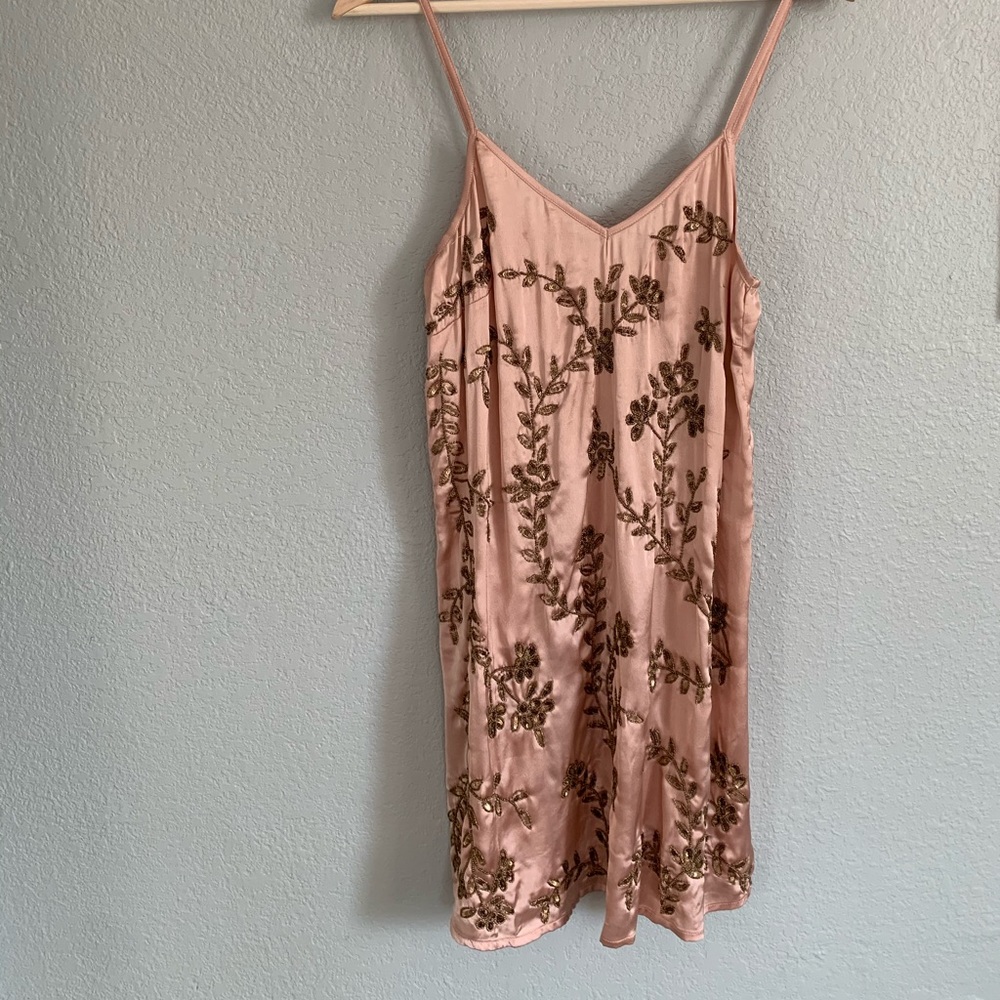 Pink slip with bronze embroidery